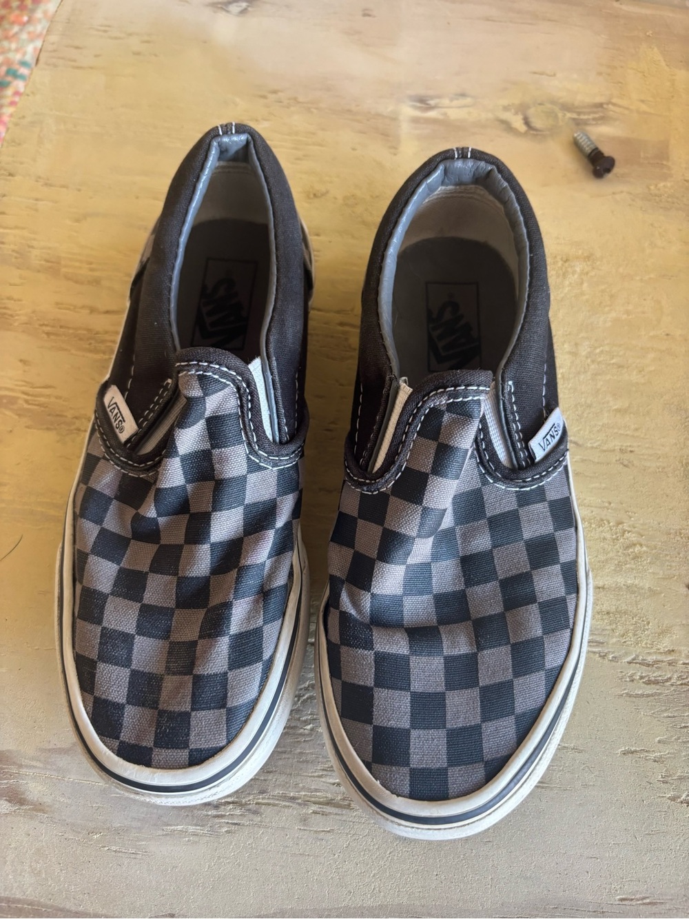 Vans Kids Checkerboard Slip-On Sneakers in Black and Gray